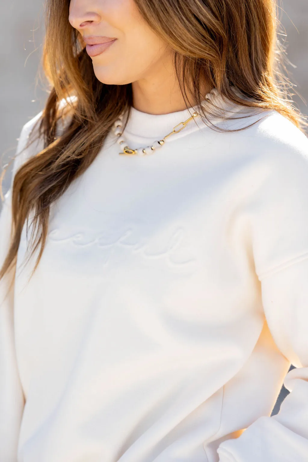 Cheerful Cursive Embossed Crewneck