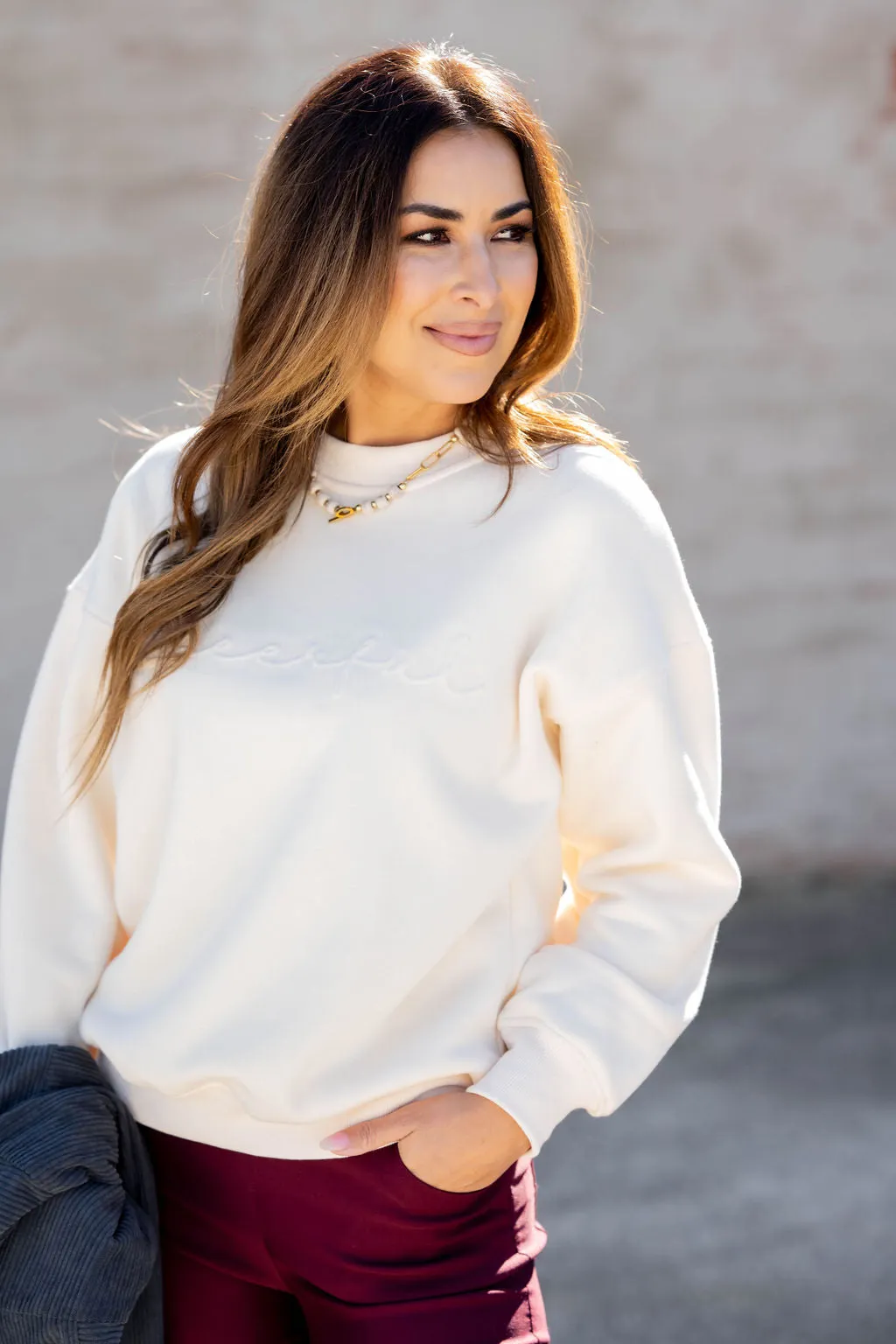 Cheerful Cursive Embossed Crewneck